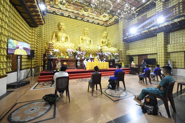Cận kề xuân sang, tình nguyện viên Phật giáo tiếp tục đến hỗ trợ chăm sóc bệnh nhân Covid-19 nặng tại bệnh viện Chợ Rẫy
